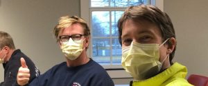 (Photo: Chatham firefighters breathe into surgical masks as part of a new cancer screening program. The masks were sent to CancerDogs, a program in Canada that uses trained dogs to sniff out cancer cells captured in the masks. COURTESY PHOTO)