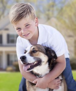 kid and dog