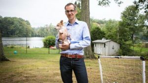 Roel Verhaak, a biologist who is researching brain cancer at The Jackson Lab, and his dog, Lola. (The Jackson Laboratory) 