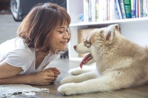girl and puppy