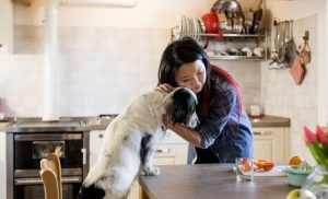 girl hugging dog_super foods