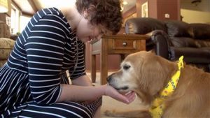 Emily Brown and her Golden Retriever
