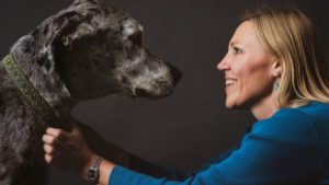 Audrey Ruple, a veterinary epidemiologist and assistant professor of One Health Epidemiology in the College of Health and Human Sciences’ Department of Public Health with Bitzer, a Great Dane. Purdue University photo/Rebecca Wilcox